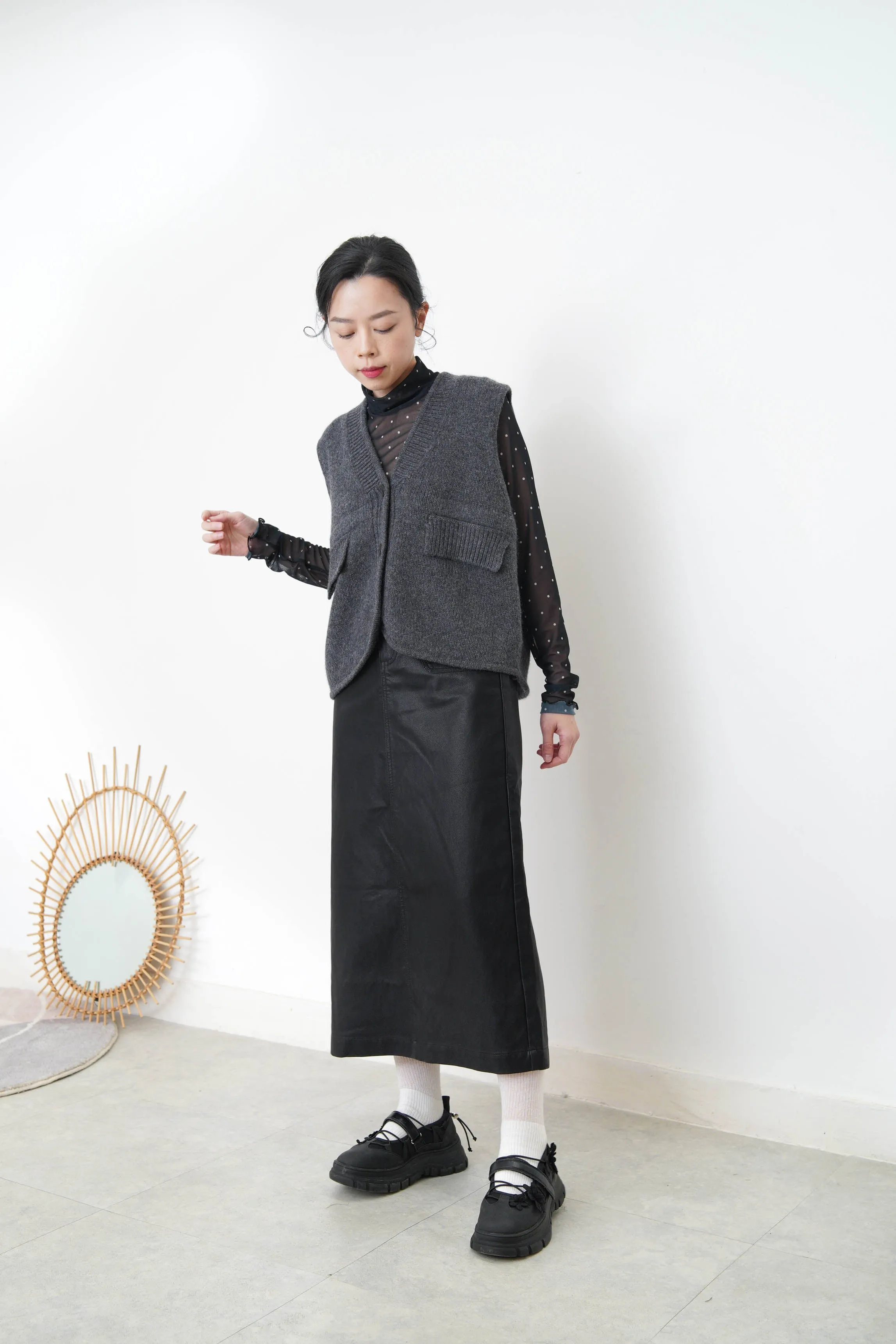 Charcoal alpaca vest in round hem